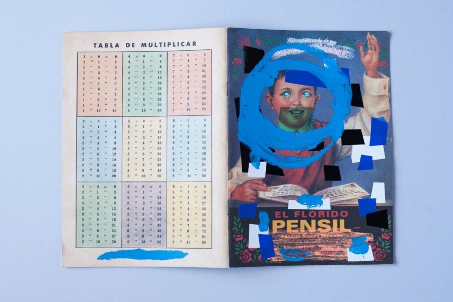 Contracubierta con la tabla de multiplicar y cubierta de El Florido Pensil intervenida con un círculo azul y recortes de papel, sobre fondo azul